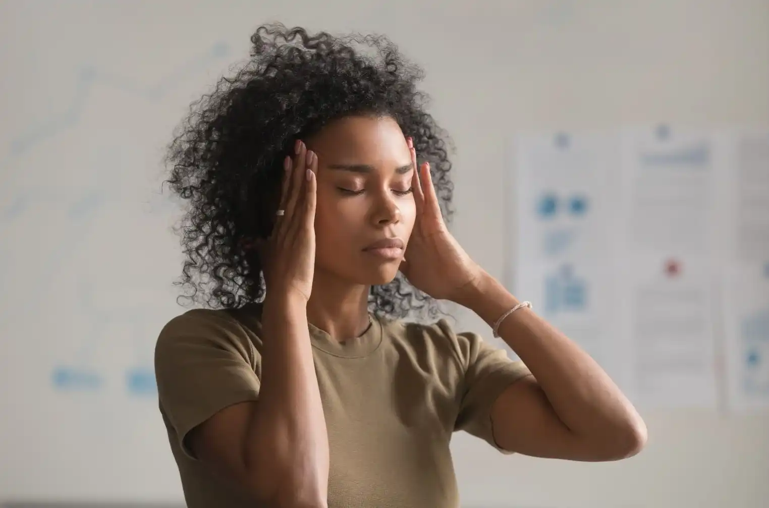A woman feeling the weight of leadership